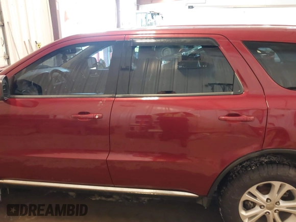 2013 Dodge Durango SXT with VIN 1C4RDJAG4DC527945, listed as a IAAI auction lot 41590545 with 141,074 mi miles and . Bid and sale history available at DreamBid. Image 15.