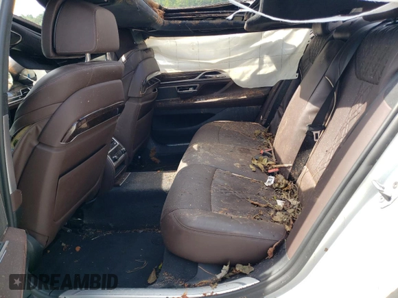 2018 BMW 7 Series 750i with VIN WBA7F0C55JGM23022, listed as a Copart auction lot 63495573 with 0 mi miles and Salvage Title. Bid and sale history available at carsss.com. Image 10.