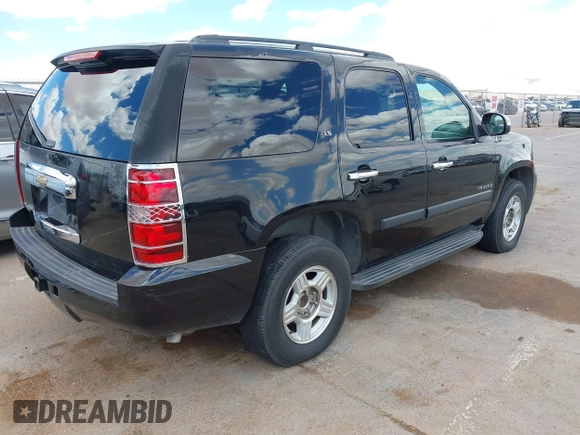 2007 Chevrolet Tahoe LS with VIN 1GNFC13C47J406467, listed as a IAAI auction lot 42081860 with 275,814 mi miles and . Bid and sale history available at DreamBid. Image 4.