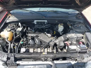 2006 Ford Escape XLT with VIN 1FMYU03186KA06262, listed as a IAAI auction lot 41912605 with 157,117 mi miles. Bid and sale history available at carsss.com. Image 10.