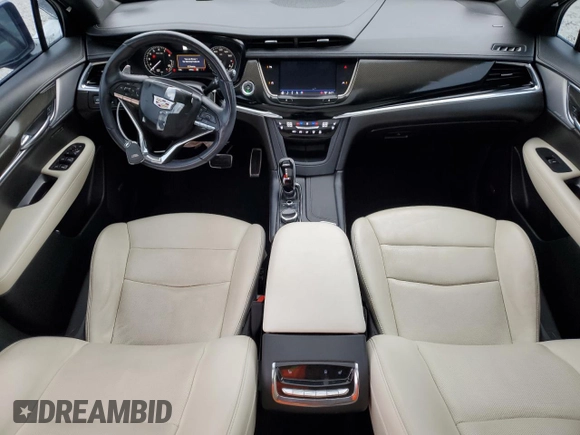 2023 Cadillac XT6 AWD Sport z VIN 1GYKPGRS6PZ126039, wystawiony jako Copart lot #55948605 z przebiegiem 39 966 mil mil oraz Szkoda całkowita • Salvage title. Historia ofert i sprzedaży dostępna na DreamBid. Obrazek 8.