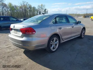 2013 Volkswagen Passat TDI SE with VIN 1VWBN7A34DC103273, listed as a IAAI auction lot 42051516 with 105,607 mi miles. Bid and sale history available at carsss.com. Image 4.