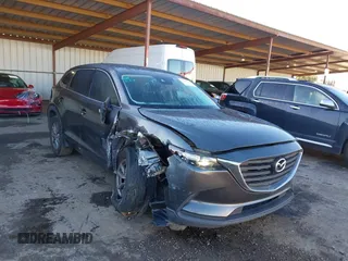 2018 Mazda CX-9 Sport z VIN JM3TCABY8J0203093, wystawiony jako IAAI lot #41218241 z przebiegiem 130 832 mil mil oraz . Historia ofert i sprzedaży dostępna na DreamBid. Obrazek 6.