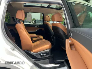 2020 BMW X7 xDrive40i z VIN 5UXCW2C0XL9B92841, wystawiony jako Copart lot #58982025 z przebiegiem 127 416 mil mil oraz Czysty tytuł • Clean title. Historia ofert i sprzedaży dostępna na DreamBid. Obrazek 6.
