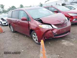 2015 Toyota Sienna LE AAS with VIN 5TDKK3DC2FS571486, listed as a IAAI auction lot 42681163 with 206,491 mi miles and . Bid and sale history available at DreamBid. Image 1.