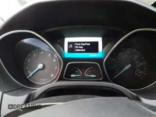 2014 Ford Focus Titanium with VIN 1FADP3J25EL310199, listed as a IAAI auction lot 40682901 with 84,885 mi miles and . Bid and sale history available at DreamBid. Image 7.