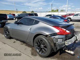 2015 Nissan 370Z with VIN JN1AZ4EH2FM444159, listed as a Copart auction lot 71005944 with 54,063 mi miles and Salvage Title. Bid and sale history available at carsss.com. Image 2.