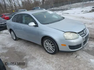 2008 Volkswagen Jetta Sedan Wolfsburg with VIN 3VWRJ71K18M185744, listed as a IAAI auction lot 41389714 with 107,446 mi miles. Bid and sale history available at carsss.com. Image 1.