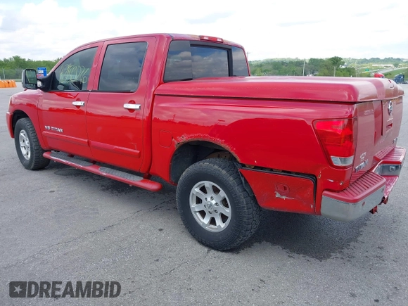2005 Nissan Titan SE with VIN 1N6BA07B35N500027, listed as a IAAI auction lot 42150226 with 200,877 mi miles. Bid and sale history available at carsss.com. Image 3.