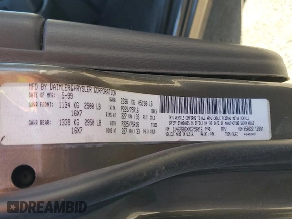 1999 Jeep Grand Cherokee Limited with VIN 1J4G268SXXC759016, listed as a Copart auction lot 80307534 with 215,870 mi miles and Salvage title. Bid and sale history available at DreamBid. Image 13.