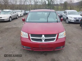 2009 Dodge Grand Caravan SXT z VIN 2D8HN54X69R593635, wystawiony jako IAAI lot #39235325 z przebiegiem 207 996 mil mil oraz . Historia ofert i sprzedaży dostępna na DreamBid. Obrazek 12.