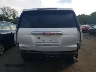 2018 GMC Yukon Denali with VIN 1GKS2CKJ4JR161009, listed as a Copart auction lot 74598914 with 106,891 mi miles and Salvage Title. Bid and sale history available at carsss.com. Image 6.