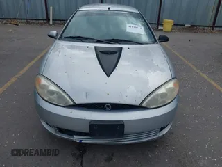 2002 Mercury Cougar z VIN 1ZWFT61L325609417, wystawiony jako IAAI lot #42119713 z przebiegiem 142 029 mil mil oraz . Historia ofert i sprzedaży dostępna na DreamBid. Obrazek 6.