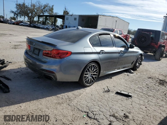2018 BMW 5 Series M550i xDrive with VIN WBAJB9C53JB034947, listed as a Copart auction lot 77270534 with Not provided miles and Non repairable. Bid and sale history available at DreamBid. Image 3.