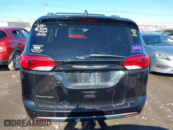 2018 Chrysler Pacifica Touring L with VIN 2C4RC1BGXJR157184, listed as a IAAI auction lot 41803388 with 102,095 mi miles and . Bid and sale history available at DreamBid. Image 16.