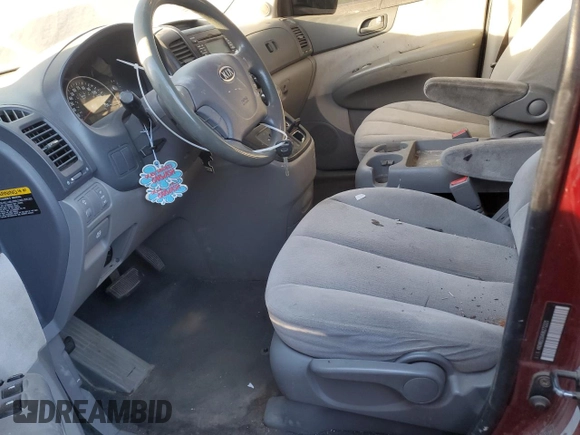2009 Kia Sedona LX with VIN KNDMB233496272221, listed as a Copart auction lot 81194384 with 227,139 mi miles and Salvage Title. Bid and sale history available at carsss.com. Image 7.