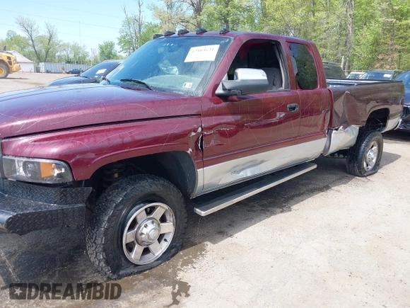 2002 Dodge 2500 z VIN 3B7KF23C92M244271, wystawiony jako IAAI lot #42104621 z przebiegiem 179 986 mil mil oraz . Historia ofert i sprzedaży dostępna na DreamBid. Obrazek 6.
