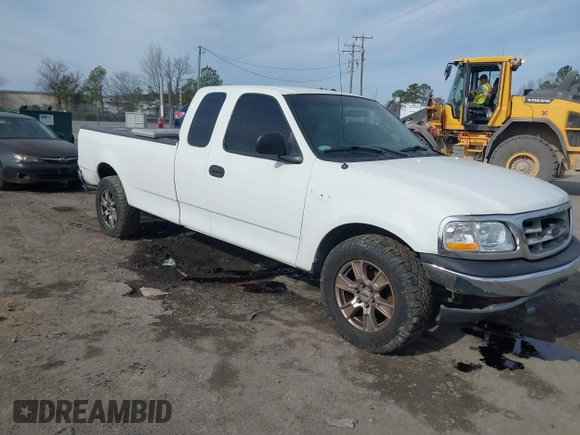 2000 Ford F-150 XL with VIN 1FTRX17LXYNC39983, listed as a IAAI auction lot 41750277 with 170,016 mi miles. Bid and sale history available at carsss.com. Image 1.