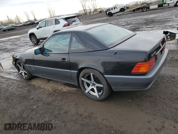 1994 Mercedes-Benz SL 5.0L with VIN WDBFA67E3RF102932, listed as a Copart auction lot 79107264 with 149,344 mi miles and Salvage title. Bid and sale history available at DreamBid. Image 2.