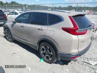2018 Honda CR-V Touring with VIN 5J6RW1H98JL000031, listed as a IAAI auction lot 40605651 with 129,516 mi miles and . Bid and sale history available at DreamBid. Image 3.