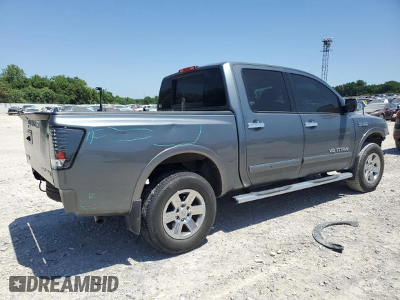 2015 Nissan Titan Pro-4X with VIN 1N6BA0EC5FN514184, listed as a Copart auction lot 56721065 with 127,283 mi miles and Salvage title. Bid and sale history available at DreamBid. Image 3.
