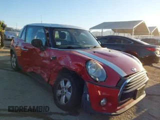 2017 MINI Hardtop 4 Door Cooper with VIN WMWXU1C59H2E17648, listed as a IAAI auction lot 41751607 with 77,619 mi miles. Bid and sale history available at carsss.com. Image 1.