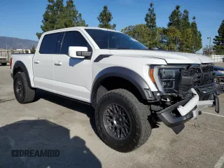 2022 Ford F-150 Raptor with VIN 1FTFW1RG4NFB63687, listed as a Copart auction lot 87479684 with 32,921 mi miles and Salvage Title. Bid and sale history available at carsss.com. Image 4.