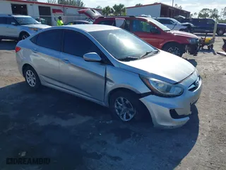 2013 Hyundai Accent GLS with VIN KMHCT4AE4DU316131, listed as a IAAI auction lot 42026497 with 125,981 mi miles. Bid and sale history available at carsss.com. Image 1.