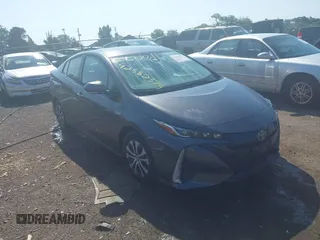 2021 Toyota Prius LE with VIN JTDKAMFP1M3189778, listed as a IAAI auction lot 42582379 with Not provided miles and . Bid and sale history available at DreamBid. Image 1.