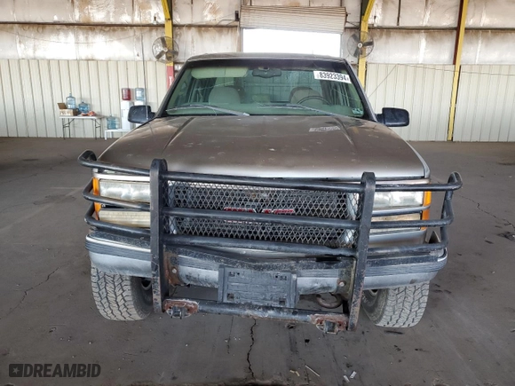 1999 GMC Sierra 2500 Crew Cab with VIN 1GTGK23R7XF048181, listed as a Copart auction lot 83923394 with NaN miles and Salvage Title. Bid and sale history available at carsss.com. Image 5.