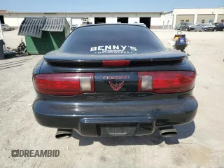 1997 Pontiac Firebird with VIN 2G2FS22K8V2212704, listed as a Copart auction lot 48853145 with 130,474 mi miles and Salvage Title. Bid and sale history available at carsss.com. Image 6.