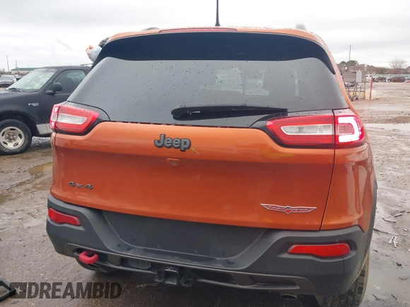 2016 Jeep Cherokee Trailhawk z VIN 1C4PJMBS0GW155379, wystawiony jako IAAI lot #41472352 z przebiegiem 116 036 mil mil oraz . Historia ofert i sprzedaży dostępna na DreamBid. Obrazek 16.