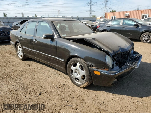 2002 Mercedes-Benz E-Class with VIN WDBJF70J22B489706, listed as a Copart auction lot 71109874 with 59,167 mi miles and Salvage Title. Bid and sale history available at carsss.com. Image 4.