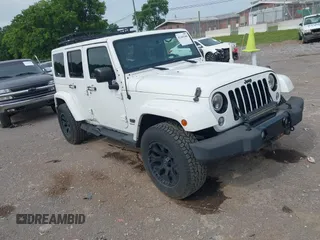 2014 Jeep Wrangler Unlimited Sahara with VIN 1C4BJWEG2EL230725, listed as a IAAI auction lot 42441544 with 93,066 mi miles and . Bid and sale history available at DreamBid. Image 1.