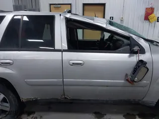 2005 Chevrolet TrailBlazer LT with VIN 1GNDT13SX52357796, listed as a IAAI auction lot 41510963 with 218,766 mi miles. Bid and sale history available at carsss.com. Image 13.