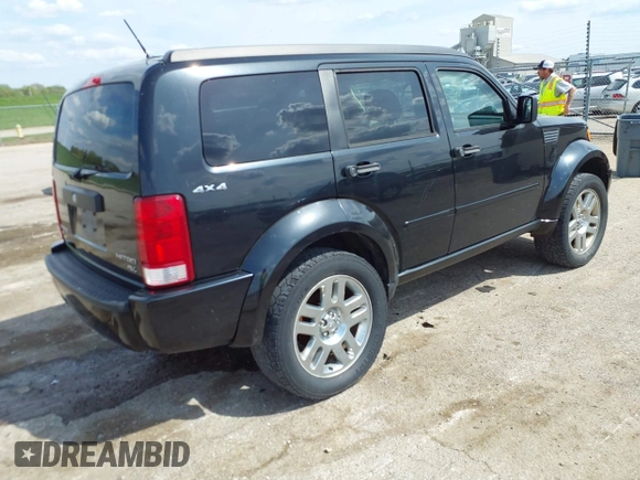 2011 Dodge Nitro Heat with VIN 1D4PU4GX9BW607580, listed as a IAAI auction lot 42105529 with 143,795 mi miles. Bid and sale history available at carsss.com. Image 4.