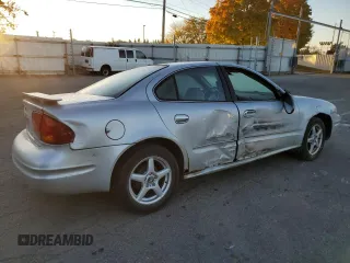 2003 Oldsmobile Alero GL1 z VIN 1G3NL52F13C182905, wystawiony jako Copart lot #77264384 z przebiegiem Nie podano mil oraz Szkoda całkowita • Salvage title. Historia ofert i sprzedaży dostępna na DreamBid. Obrazek 3.