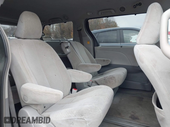 2012 Toyota Sienna LE AAS with VIN 5TDKK3DC5CS253020, listed as a IAAI auction lot 40900034 with 208,421 mi miles. Bid and sale history available at carsss.com. Image 8.