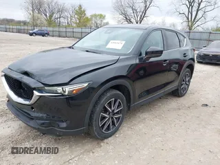 2018 Mazda CX-5 Grand Touring with VIN JM3KFBDM3J0384431, listed as a IAAI auction lot 42013474 with 65,018 mi miles. Bid and sale history available at carsss.com. Image 2.