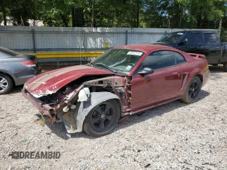 2004 Ford Mustang Standard with VIN 1FAFP40674F136300, listed as a Copart auction lot 86332804 with 163,996 mi miles and Salvage Title. Bid and sale history available at carsss.com. Image 1.