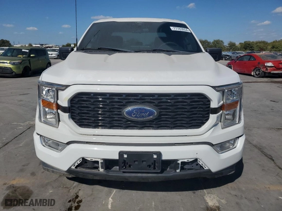 2021 Ford F-150 XL with VIN 1FTEW1C89MKE55077, listed as a Copart auction lot 77783054 with 32,935 mi miles and Salvage Title. Bid and sale history available at carsss.com. Image 5.