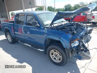 2004 Dodge Dakota Sport z VIN 1D7HG38N84S709758, wystawiony jako IAAI lot #42168491 z przebiegiem 238 479 mil mil oraz . Historia ofert i sprzedaży dostępna na DreamBid. Obrazek 1.