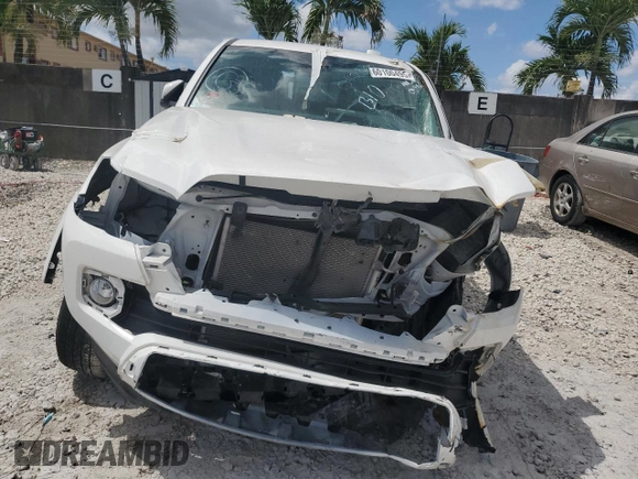 2023 Toyota Tacoma SR5 z VIN 3TYAZ5CN7PT042367, wystawiony jako Copart lot #60100495 z przebiegiem Nie podano mil oraz Nie do naprawy • Non repairable. Historia ofert i sprzedaży dostępna na DreamBid. Obrazek 5.