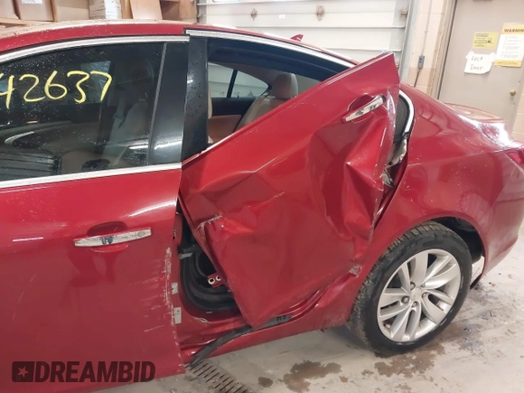 2014 Buick Regal Premium I with VIN 2G4GN5EX0E9171875, listed as a IAAI auction lot 42642637 with 129,479 mi miles and . Bid and sale history available at DreamBid. Image 6.