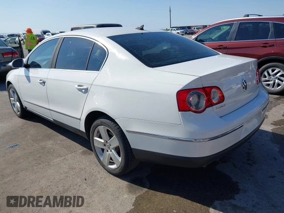 2009 Volkswagen Passat z VIN WVWJK93C29P033434, wystawiony jako IAAI lot #41698532 z przebiegiem 129 256 mil mil oraz . Historia ofert i sprzedaży dostępna na DreamBid. Obrazek 3.
