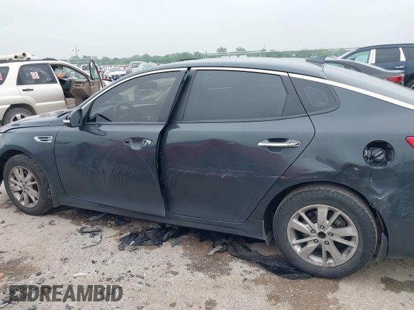 2016 Kia Optima LX z VIN KNAGT4L30G5070000, wystawiony jako IAAI lot #42169747 z przebiegiem 267 498 mil mil oraz . Historia ofert i sprzedaży dostępna na DreamBid. Obrazek 14.