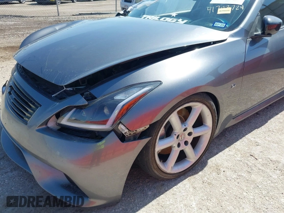 2014 Infiniti Q60 Journey z VIN JN1CV6EK1EM110800, wystawiony jako IAAI lot #41793724 z przebiegiem 134 408 mil mil oraz . Historia ofert i sprzedaży dostępna na DreamBid. Obrazek 18.