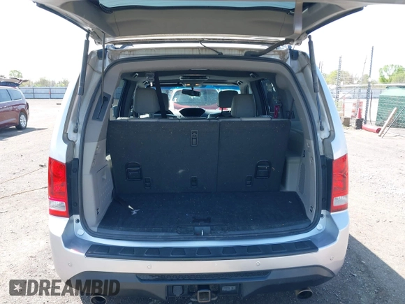 2013 Honda Pilot Touring with VIN 5FNYF3H95DB032438, listed as a IAAI auction lot 41865938 with 298,973 mi miles and . Bid and sale history available at DreamBid. Image 17.