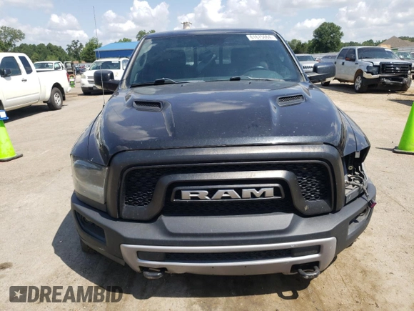 2015 Ram 1500 Rebel z VIN 1C6RR7YT4FS751370, wystawiony jako Copart lot #61675064 z przebiegiem 90 245 mil mil oraz Szkoda całkowita • Salvage title. Historia ofert i sprzedaży dostępna na DreamBid. Obrazek 5.