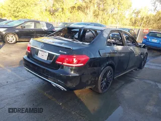 2014 Mercedes-Benz E 550 Sport with VIN WDDHF9BB0EA820235, listed as a IAAI auction lot 40606923 with Not Provided miles and . Bid and sale history available at DreamBid. Image 4.